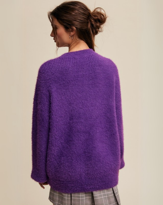 Own The Game” Fuzzy Oversized Knit Sweater